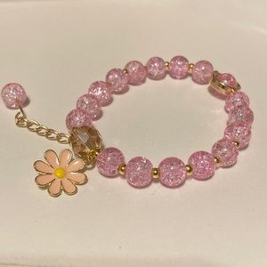 Pink Beaded Bracelet With Daisy Charm